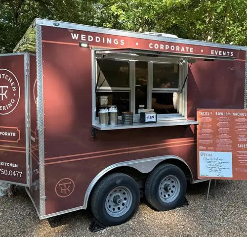 Menu for a trailer serving gourmet dishes.